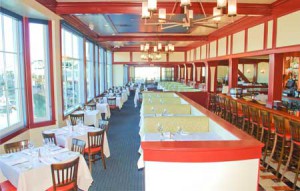 tables and chairs in main fog harbor dining room