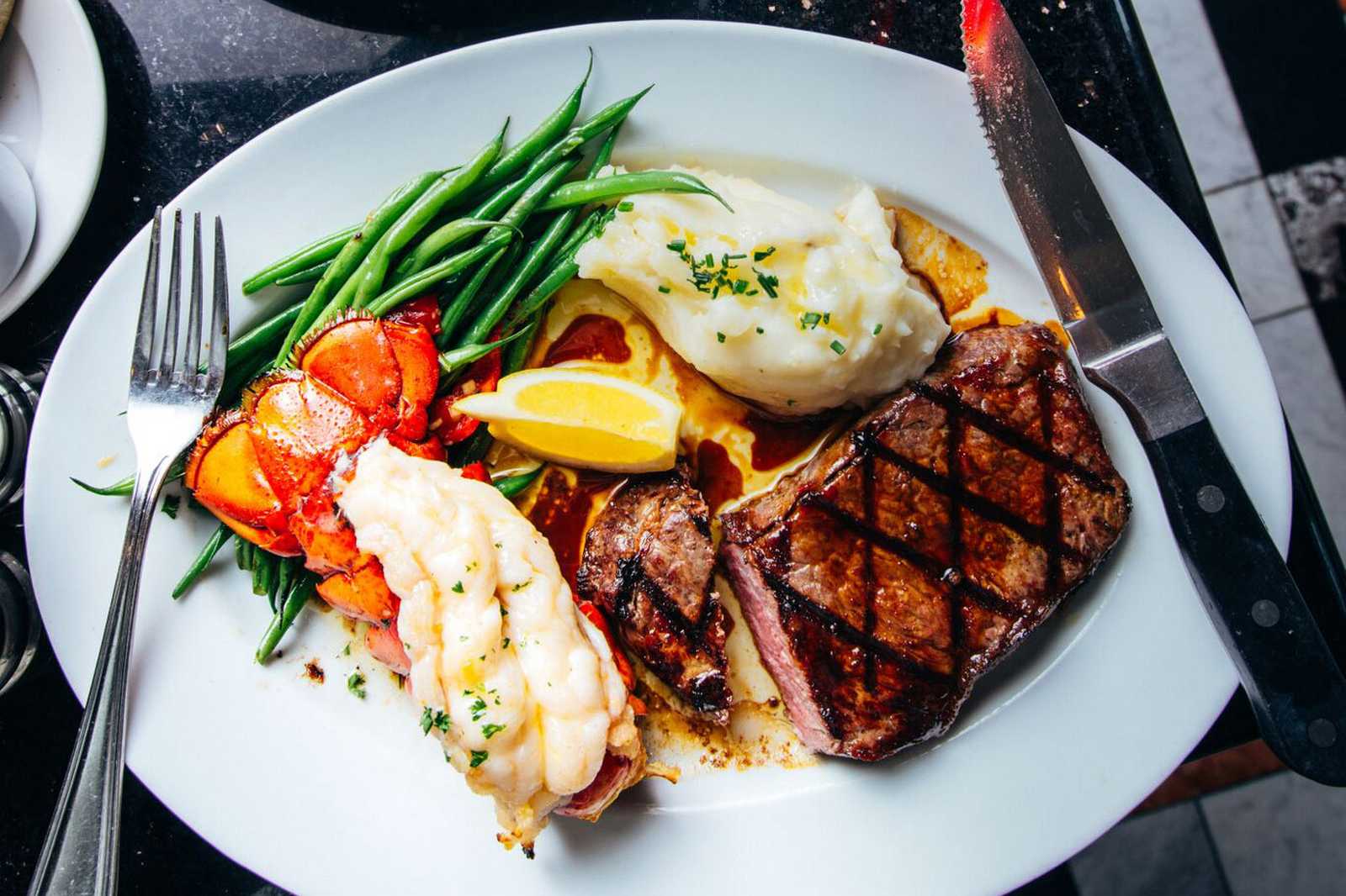 https://fogharbor.com/wp-content/uploads/2018/05/steak-seafood-plate-1.jpg