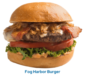 A fresh Angus chuck patty, grilled onions, jack cheese, bacon, Chipotle 1000 island dressing between burger buns and the caption Fog Harbor Burger