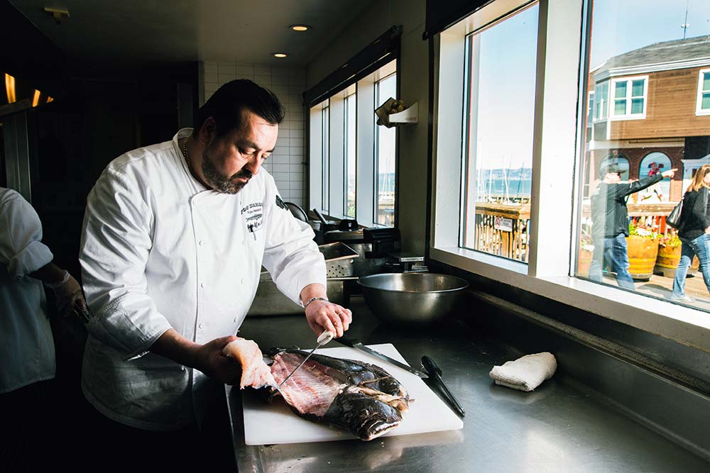San Francisco chef Adolfo Soto preparing fresh crab