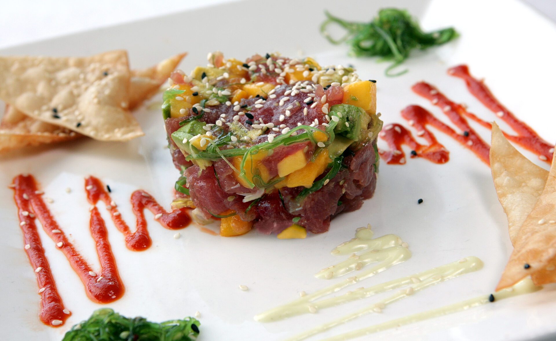 Tuna Poke and sauce on a plate