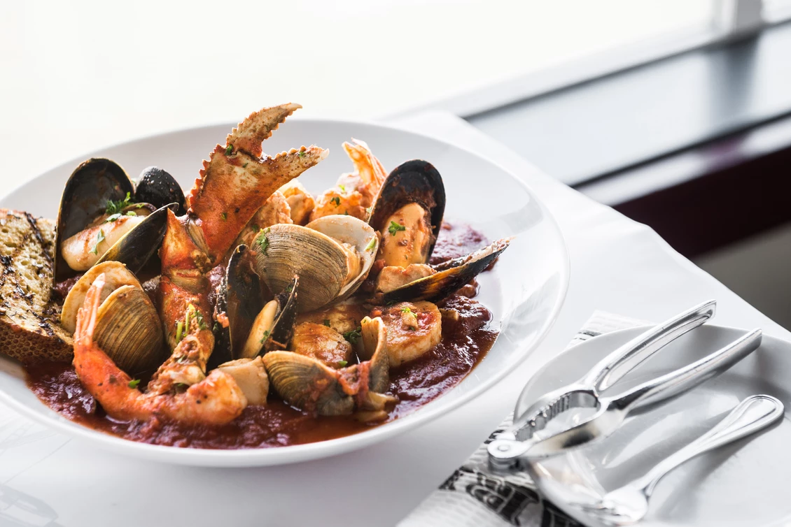 Fresh cioppino with crab, shrimp, clams, and mussels served at Fog Harbor Fish House on PIER 39.